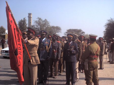 RED FLAG DAY COMMEMORATION WINDHOEK, 25 August 2002 - The Red Flag Day, an annual event, was commemorated at Okahandja. Seen here are troops of the Red Flag marching towards the graves to pay homage to the fallen heroes killed by Germans in 1904. (Photo by: Herman Ngasia) NAMPA