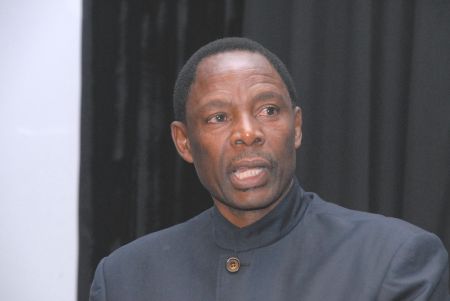 WINDHOEK, 14 June 2009 - Health and Social Services Miniater, Richard Kamwi officiating at the closing session of the five-days 2009 HIV/AIDS Implementers' Meeting held at Safari Hotel. More than 2000 delegates from sixty countries accross the World attended the 6th Implementers' Meeting. (Photo by: Joseph Nekaya) NAMPA