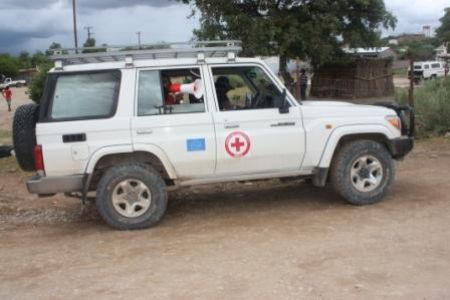 OPUWO, 09 FEB 2010 - (NAMPA) - The Namibia Red Cross Society car seen on the streets of Opuwo on Tuesday announcing and inviting people to go to different points of vaccination in the town to get their measles vaccines. (Photo by: Tjikunda Kulunga) Nampa 