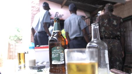 WINDHOEK, 10 October 2012- Glasses of alcohol and beer and some empty alcohol bottles pictured when members of the Katutura Police station visited several informal drinking hotspots in their jurisdiction, informing operators about the measures to curb illegal shebeen operations. (Photo by: Francois Lottering) NAMPA