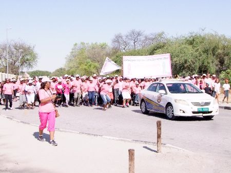 ONGWEDIVA, 18 October 2014 - The Ongwediva Medipark Private Hospital held its second Breast and Cervical Cancer Awareness Walk at Ongwediva in the Oshana Region on Saturday. Participants, including doctors and other medical officials, are pictured here during the walk. (Photo by: Mathias Nanghanda) NAMPA 