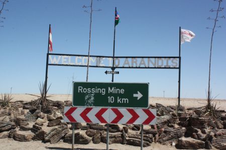 ARANDIS, 18 February 2015 - A gateway sign welcoming visitors to the mining town of Arandis in Namibia's Erongo Region. The road sign indicates the direction and distance to the Rossing Uranium Mine.(Photo by: Paulus Kiiyala Shiku) NAMPA