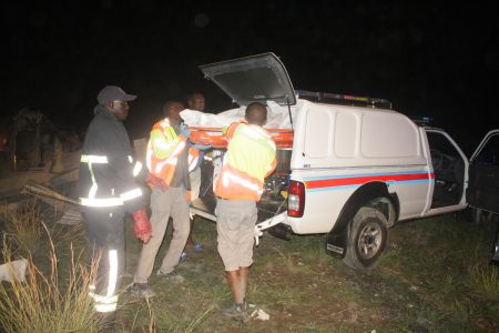 OTJIWARONGO, 07 April 2015 – A 43-year-old truck driver and his 24-year-old male passenger died instantly in a fatal head-on collision of two trucks on the Otjiwarongo-Otavi road on Monday evening. Here members of the Otjiwarongo police mortuary load the body of the truck driver into the police van. (Photo by: Mulisa Simiyasa) NAMPA