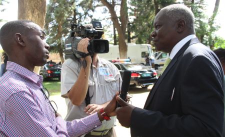 WINDHOEK, 09 February 2016 - Namibia Press Agency (NAMPA) journalists interview Usutuaije Maamberua, a Member of Parliament and President of the SWANU of Namibia party, shortly after the opening ceremony of the Third Session of the Sixth Parliament. (Photo by: Joseph Nekaya) NAMPA