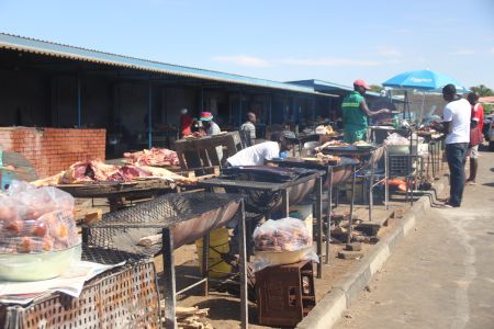 WINDHOEK, 21 December 2016 - A few Kapana lovers at the Wanaheda open market. (Photo by: Joseph Nekaya) NAMPA