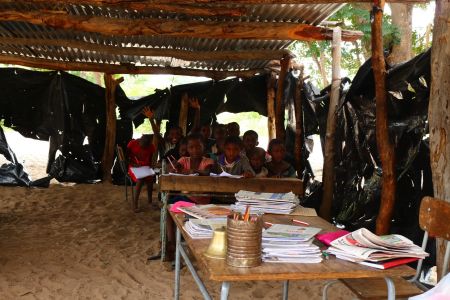 NDIYONA, 24 February 2017 - Learners attend class in a structure made of plastic, wooden poles and a corrugated iron roof at Mungaya Junior Primary School in the Ndiyona Constituency. (Photo by: Francois Lottering) NAMPA