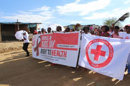 WINDHOEK, 01 December 2017 - Residents of Kilimanjaro informal settlement in Windhoek marching in commemoration of World Aids Day. The day serves as an opportunity for people worldwide to unite in the fight against HIV, to show support for people living with HIV, and to commemorate those who have died from an Aids-related illness. (Photo by:Petrus Muronga) NAMPA