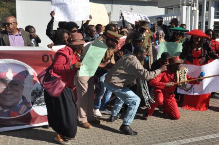 WINDHOEK, 26 July 2018 - Members of the Ovaherero Genocide Foundation demonstrating outside United Nations (UN) House, where they handed over a petition. (Photo by: Elizabeth Shaakuka) NAMPA 