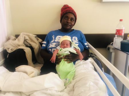 SWAKOPMUND, 26 December 2022 - New mother Panduleinge Shikweyo and her newborn baby girl Iyaloo who was born at 05h30 on Christmas Day in the Swakopmund State Hospital. Shikweyo is one of four mothers who gave birth on 25 December in that Hospital. (Photo by: Isabel Bento) NAMPA