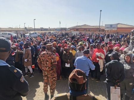 SWAKOPMUND, 12 June 2023 - Members of the Police Force addressing the hundreds of parents who gathered at the Mondesa Multi-Purpose Centre in Swakopmund to register their children for enrolment of pre-primary school and grade 1. (Photo by: Isabel Bento) NAMPA