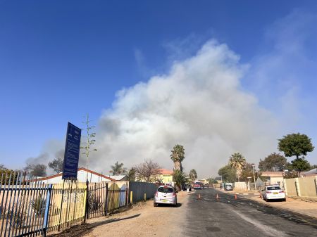 WINDHOEK, 25 June 2023 - A veld fire broke out in a riverbed in Hochland Park on Saturday. (Photo by: Linea Dishena) NAMPA 