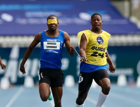PARIS, 14 July 2023 – T11 male Paralympic sprinter Ananias Shikongo and his guide Even Tjiuiju (right) in action during the men’s T11, 400 metres (m) at the Charlety Stadium during the International Paralympic Committee (IPC) 2023 World Para Athletics Championships in Paris, France. (Photo by: Hesron Kapanga) NAMPA