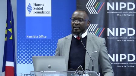 WINDHOEK, 01 August 2023 - The Chairperson of the Economic Association of Namibia (EAN), Jason Kasuto, speaks at the official launch of the National Oil and Gas Conference 2023. (Photo by: Uendjizuvira Kandanga) NAMPA