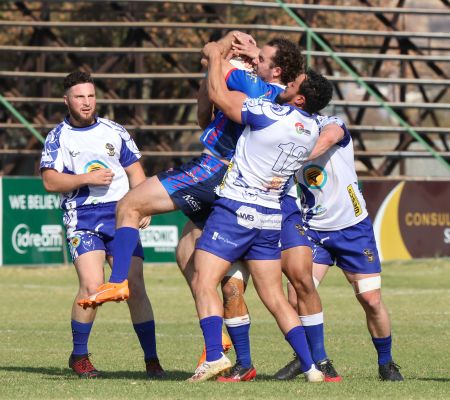 WINDHOEK, 19 August 2023 – Trustsco United (players in blue) in action against Walvis Bay based Kudus (in blue and white) during the semi-finals of the 2023 Namibia Rugby Union (NRU) Premier League at the Hage Geingob Stadium. (Photo by: Hesron Kapanga) NAMPA 