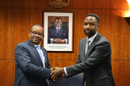 WINDHOEK, 02 May 2024 - The Chairperson of the National Council, Lukas Sinimbo Muha (R), has reappointed Tousy Namiseb (L) as the Secretary to the National Council for a period of five years. (Photo: Contributed)
