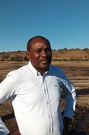 Environment, Forestry and Tourism Minister Pohamba Shifeta at the Salambala Conservancy where over One hundred hippopotamus are stranded in the mud.