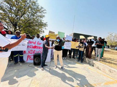 OSHAKATI, 13 August 2024 - Learners and teachers in the Oshana Region protested against the dismissal of Petrus Ndeulita, a teacher who was dismissed recently following an incident in which he allegedly forced a Grade 7 learner to hold a chair over his head for an extended period. (Photo: Contributed)