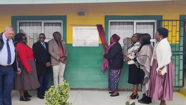 SWAKOPMUND, 16 August 2024 - Vice President Netumbo Nandi-Ndaitwah officially unveils the plaque on the newly constructed boundary wall at the Festus !Gonteb Primary School in Swakopmund. (Photo by: Isabel Bento) NAMPA