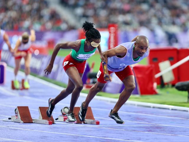 PARIS, 30 August 2024 - Namibia's T11 Paralympic sprinter, Lahja Ishitile and her guide Sem Shimanda competing in the T11 400 metre semi-finals during Day 1 of the field and track events at the Paris 2024 Paralympic Games. (Photo by: Hesron Kapanga) NAMPA