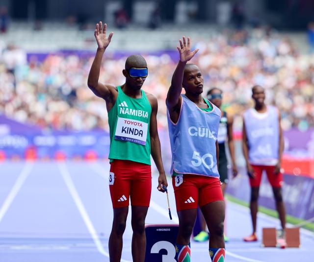 PARIS, 31 August 2024 – Paralympic sprinter Chris Kinda and his guide Kelvin Goagoseb pictured during the heat of the men’s T11 400 metre (m) race of the Paris 2024 Paralympic Games at the Stade de France in Paris. (Photo by: Hesron Kapanga) NAMPA