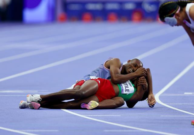 PARIS, 31 August 2024 – Paralympic sprinter Lahja Ishitile and her guide Sem Shimanda celebrate after winning a gold medal at the Paris 2024 Paralympic Games on Saturday. (Photo by: Hesron Kapanga) NAMPA
