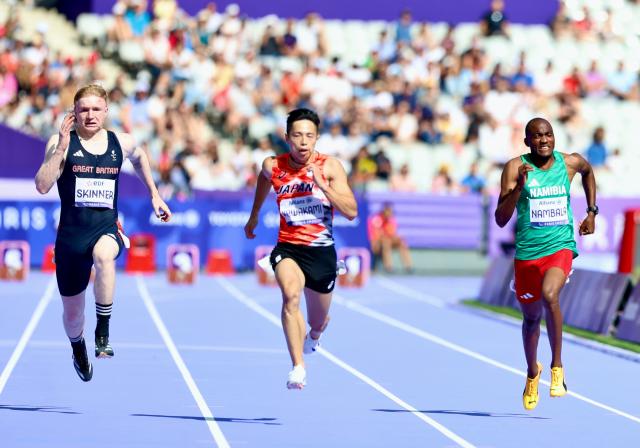 PARIS, 01 September 2024 – T13 Paralympic sprinter Johannes Nambala (R) in action alongside Shuta Kawakami of Japan (C) and Zak Skinner of Great Britain (L) during the men’s T13 100 meter heat at the Paris 2024 Paralympic Games. (Photo by: Hesron Kapanga) NAMPA
