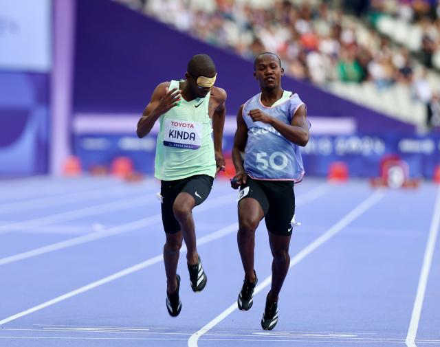 PARIS, 04 September 2024 (NAMPA) – Namibian sprinters Chris Kinda and his guide Kelvin Goagoseb in action during the heats of the men’s T11 100-meter race at the Stade de France during the Paris 2024 Paralympic Games. (Photo by: Hesron Kapanga) NAMPA