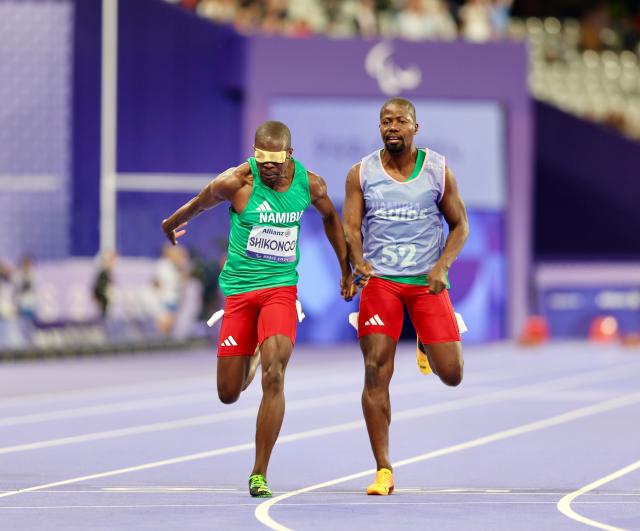 PARIS, 04 September 2024 – Namibian sprinter Ananias Shikongo and his guide Even Tjiuiju pictured during the semi-final heats of the men’s T11 100-meter race at the Stade de France. (Photo by: Hesron Kapanga) NAMPA