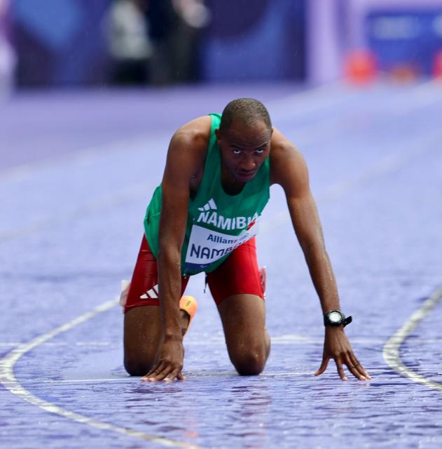 PARIS, 05 September 2024 – Sprinter Johannes Nambala catches his breath after completing the final of the men’s T13 400-meter race at a rainy Stade de France during the Paris 2024 Paralympic Games. (Photo by: Hesron Kapanga) NAMPA