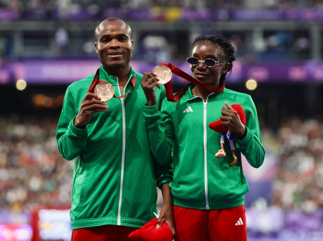 PARIS, 07 September 2024 – Paralympic sprinter Lahja Ishitile and her guide Sem Shimanda pictured with their bronze medals which they won in the women’s T11 200 metre (m) race at the Stade de Paris. (Photo by: Hesron Kapanga) NAMPA