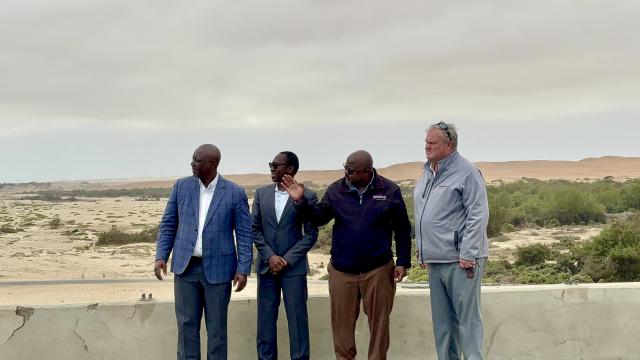 SWAKOPMUND, 18 September 2024 - (l-r) Roads Authority Chief Executive Officer Conrad LutombI, Erongo RED CEO Tino !Hanabeb,  Erongo Governor Neville Andre Itope and Erongo RED Executive Manager for Network Operations and Maintenance, Nico Niemand photographed along the Swakopmund-Walvis Bay Bridge on which street lights will soon be installed. (Photo by: Isabel Bento) NAMPA