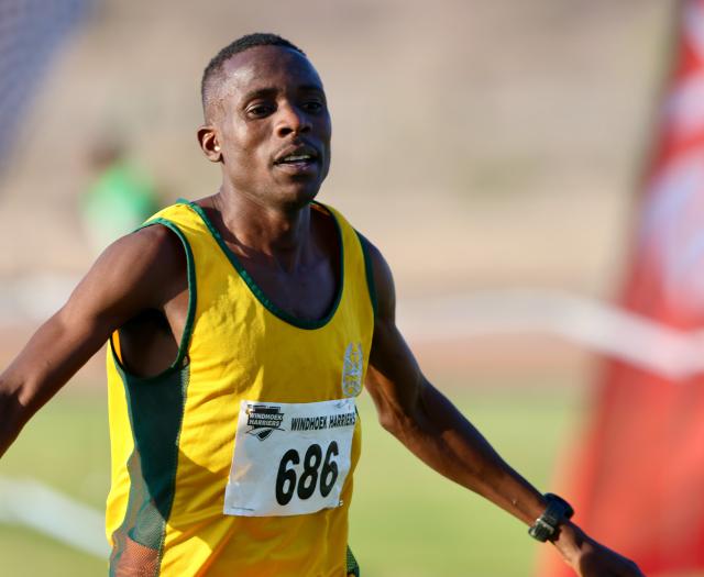 KARIBIB, 22 September 2024 - Paulus Daniel of the Namibia Correctional Service crosses the finish line during the 10th edition of the QRK Navachab half-marathon in the town of Karibib. (Photo by: Hesron Kapanga) NAMPA
