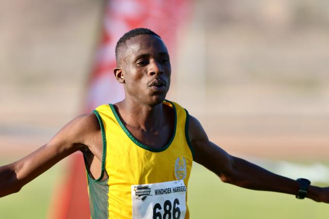 KARIBIB, 22 September 2024 - Paulus Daniel of the Namibia Correctional Service crosses the finish line during the 10th edition of the QRK Navachab half-marathon in the town of Karibib. (Photo by: Hesron Kapanga) NAMPA
