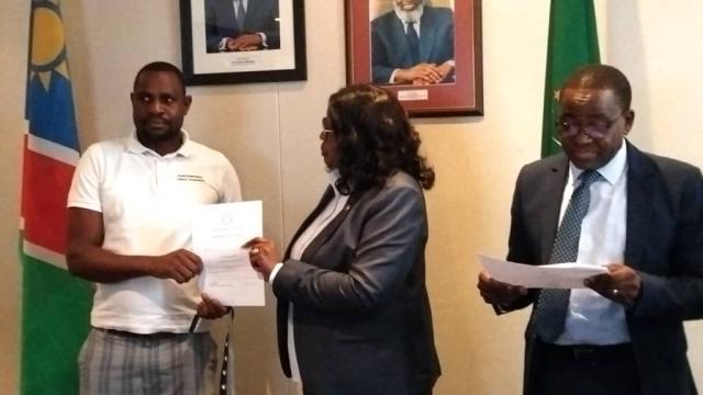 WINDHOEK, 30 September 2024 - NEFC deputy president Mathew Stefanus received the final voter register and code of conduct from ECN Chairperson Elsie Nghikembua. (Photo: Andreas Thomas) NAMPA
