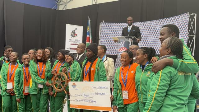 WALVIS BAY, 03 October 2024 - Deputy Prime Minister and Minister of Works and Transport John Mutorwa photographed with Team Oshana Region who were crowned champions at the National Debate competition which was part of the Walvis Bay Maritime Week. (Photo by: Isabel Bento) NAMPA