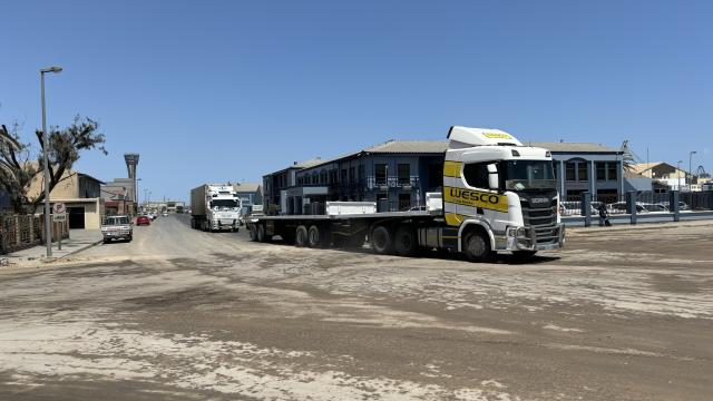 WALVIS BAY, 10 October 2024 -Trucks on the corner of Railway Street and 14th Road, which are some of the busiest roads currently in dilapidated state and form part of the rehabilitation project  at Walvis Bay. (Photo by: Isabel Bento) NAMPA