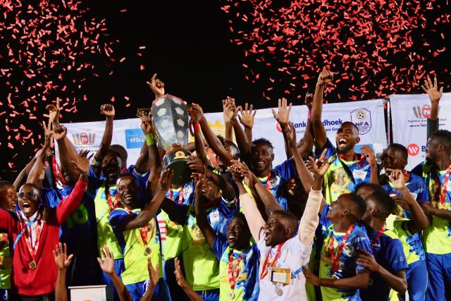 WINDHOEK, 19 September 2024 - Eeshoke Chula - Chula players celebrating with the Dr Hage Geingob Cup after defeating African Stars at the Independence Stadium during the 10th edition of the competition. (Photo by: Hesron Kapanga) NAMPA