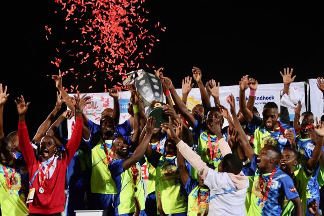 WINDHOEK, 19 October 2024 - Eeshoke Chula-Chula players celebrating with the Dr Hage Geingob Cup after defeating African Stars at the Independence Stadium during the 10th edition of the competition. (Photo by: Hesron Kapanga) NAMPA