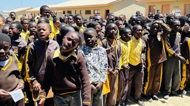 SWAKOPMUND, 31 October 2024 - Learners at the John /Awaseb Primary School at Swakopmund singing their new school anthem after not having one for the past seven years of the school’s existence. The school anthem was composed by renowned choral music composer Roger Nautoro, who is also an Arts Extension Officer in the Ministry of Education, Arts and Culture and is a tribute to the legacy of late John /Awaseb. (Photo by: Isabel Bento) NAMPA