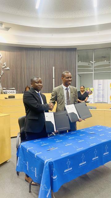 WINDHOEK, 11 November 2024 - Welwitchia University and the City of Windhoek have signed a Memorandum of Understanding (MoU) aimed at equipping students with real skills through internship programmes. Here, the Acting Vice Chancellor of Welwitchia University, Marius Hedimbi and the Chief Executive Officer of the City of Windhoek, Moses Matyayi are pictured during the signing ceremony. (Photo by: Ester Hakaala) NAMPA