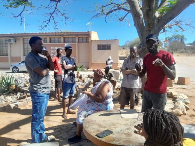 Outjo, unemployed outjo residents waiting to lodge their complaints to the Outjo Municipality regarding the residence permits (Photo: Dalene Kooper) (NAMPA)