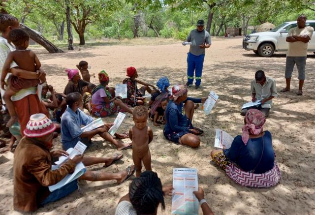 ||Nhoma, 20 November 2024 - A group of San people from the Ju|'Hoansi clan living in ||Nhoma pictured while receiving voters education from a member of the Electoral Commission of Namibia ahead of Namibia’s 2024 Presidential and National Assembly elections. (Photo: contributed) NAMPA