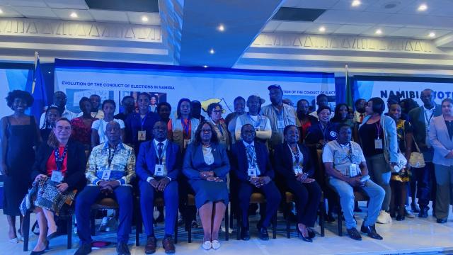 Windhoek, 22 November 2024, ECN officials (sitting) and the election observers (standing) during the briefing on Friday at Mercure Hotel in Windhoek. 
(PHOTO: Ester Hakaala) NAMPA