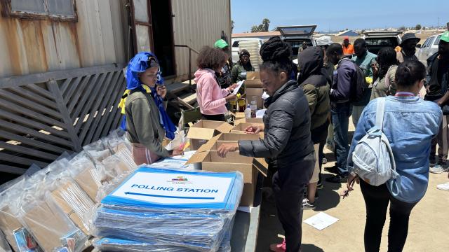 SWAKOPMUND, 26 November 2024 - Electoral Commission of Namibia (ECN)'s electoral officials collecting their none sensitive materials for ahead of deployment to their different polling stations within the regions. (Photo by: Isabel Bento) NAMPA