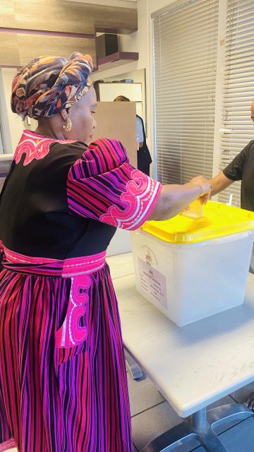  Windhoek, 27 November 2024- The governor of Khomas region Laura McLeod-Katjirua placing a ballot paper into a ballot box after voting. 
Photo: Ester Hakaala) NAMPA 