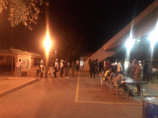 WINDHOEK, 27 November 2024 - Voters lined up at the Soweto Market Point A polling station in Windhoek after 21h00. (Photo by: Maysa Sangeve) NAMPA