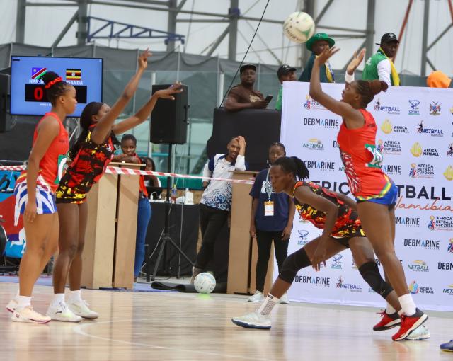 SWAKOPMUND, 11 December 2024 – Namibia national senior women’s team, Mwale Mulenamaswe (right) and Monica Gomases while in action against Ugandan players during round two of the Africa Netball Cup 2024 at the Dome in Swakopmund, Namibia. (Photo by: Hesron Kapanga) NAMPA