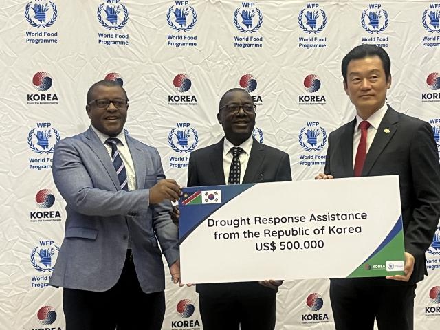 WINDHOEK, 12 December 2024 - From the left: Acting Director of WFP Tiwonge Machiwenyika with Ministure of Urban and Rural Development Erastus Uutoni  and Ambassador of the Republic of Korea to Namibia, Amb Kwang-jin Choi. (Photo: Justina Shuumbwa) NAMPA