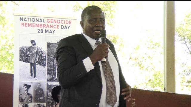 WINDHOEK, 12 January 2025- Okandjoze Chiefs Assembly technical committee Benestus Kandundu speaks during the 121st Genocide Remembrance Day at UN Plaza in Windhoek. (Photo: NAMPA TV) 