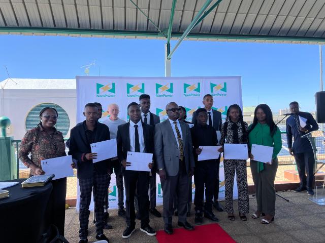 WINDHOEK, 15 January 2025 - The Managing Director at Namibia Power Corporation (NamPower), Simson Haulofu together with the 2025 NamPower bursary scheme beneficiaries at the bursary award ceremony in Windhoek. (Photo: Justina Shuumbwa) NAMPA 